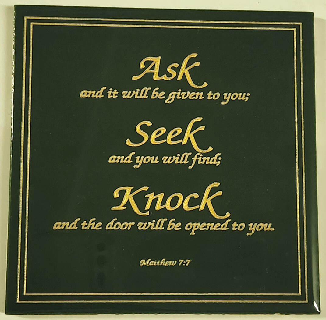 Engraved ceramic tile, paint filled